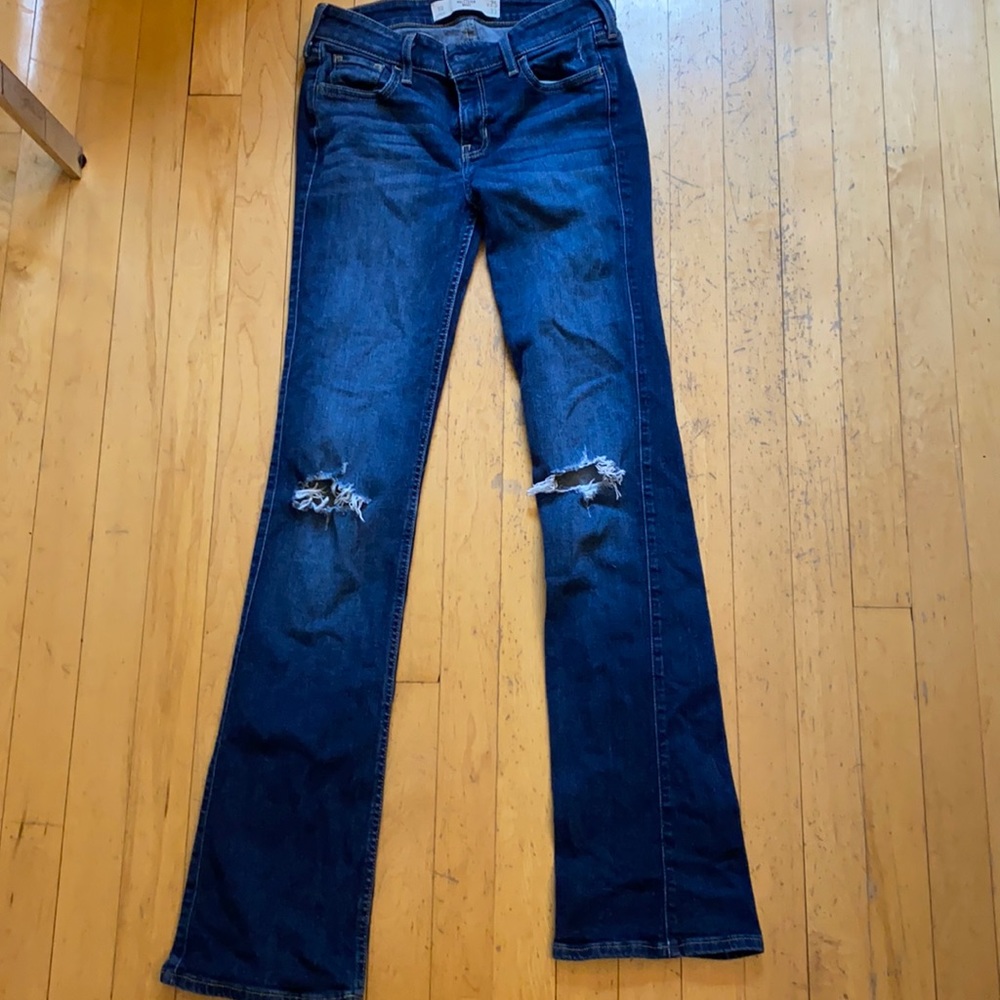 Used Low rise boot cut jeans with knee holes